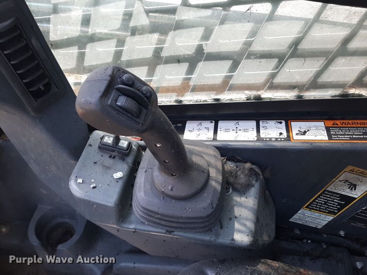 image for item DO3116 2013 John Deere 333E  tracked skid steer loader