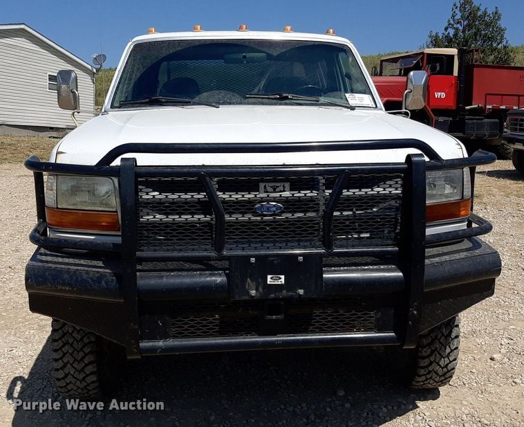 image for item DO3132 1995 Ford F350 XLT  Crew Cab flatbed pickup truck