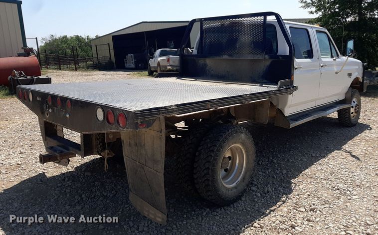 image for item DO3132 1995 Ford F350 XLT  Crew Cab flatbed pickup truck