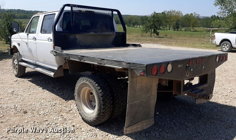 image for item DO3132 1995 Ford F350 XLT  Crew Cab flatbed pickup truck