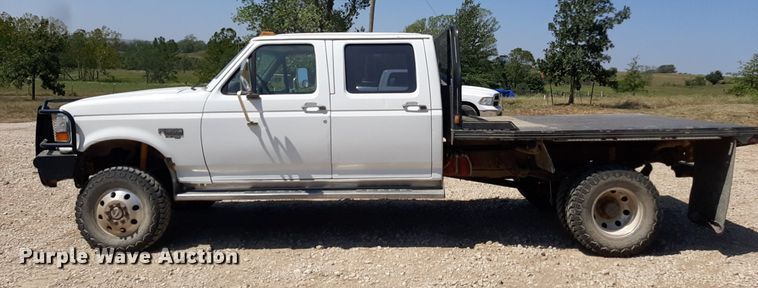 image for item DO3132 1995 Ford F350 XLT  Crew Cab flatbed pickup truck