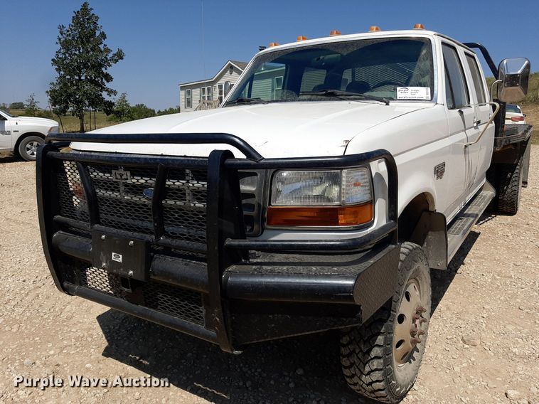 image for item DO3132 1995 Ford F350 XLT  Crew Cab flatbed pickup truck