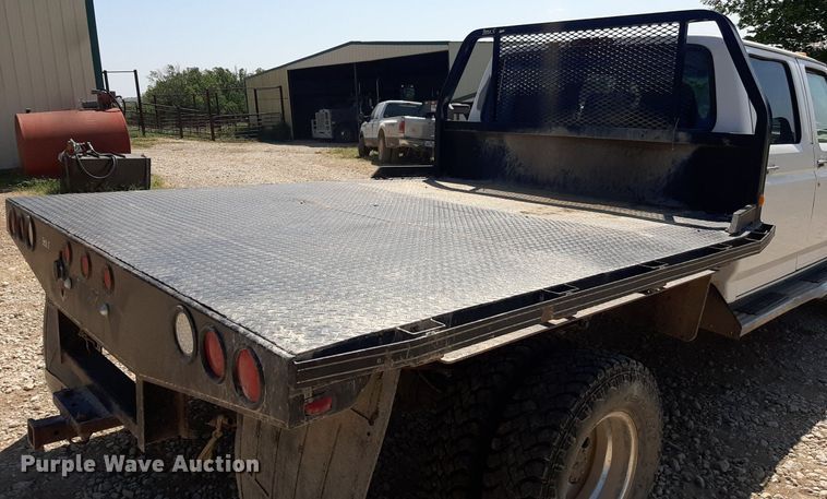 image for item DO3132 1995 Ford F350 XLT  Crew Cab flatbed pickup truck