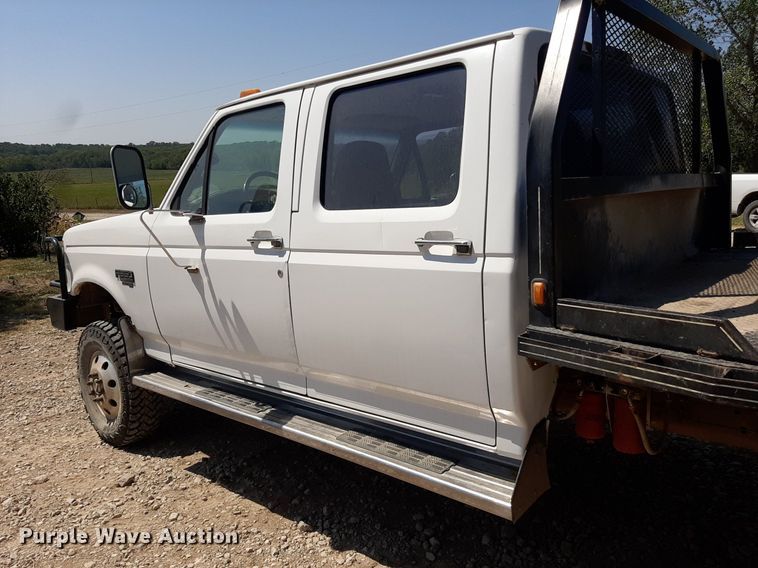 image for item DO3132 1995 Ford F350 XLT  Crew Cab flatbed pickup truck