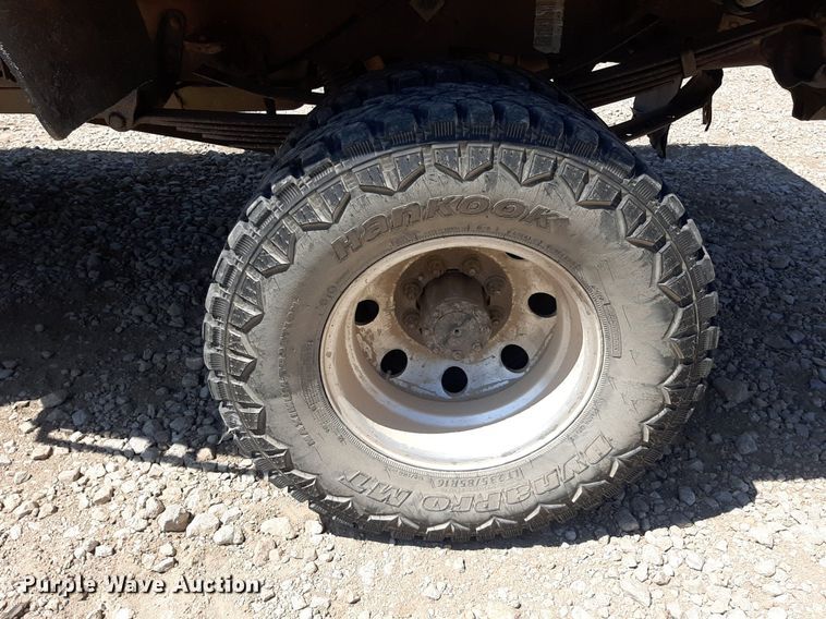 image for item DO3132 1995 Ford F350 XLT  Crew Cab flatbed pickup truck