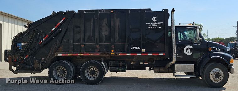 image for item DQ0250 2002 Sterling M8500 Acterra  refuse truck