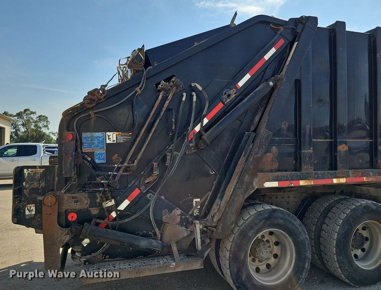 image for item DQ0250 2002 Sterling M8500 Acterra  refuse truck