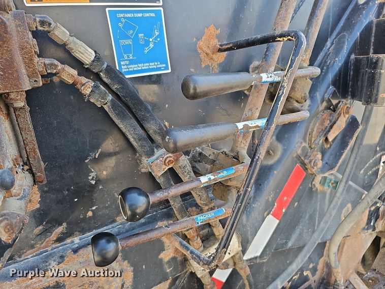 image for item DQ0250 2002 Sterling M8500 Acterra  refuse truck