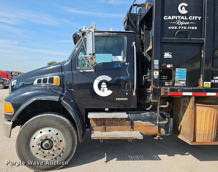 image for item DQ0250 2002 Sterling M8500 Acterra  refuse truck