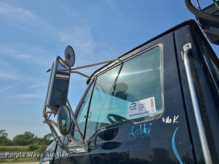 image for item DQ0250 2002 Sterling M8500 Acterra  refuse truck