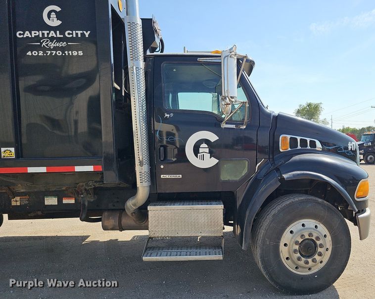 image for item DQ0250 2002 Sterling M8500 Acterra  refuse truck