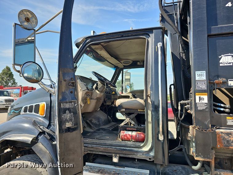 image for item DQ0250 2002 Sterling M8500 Acterra  refuse truck