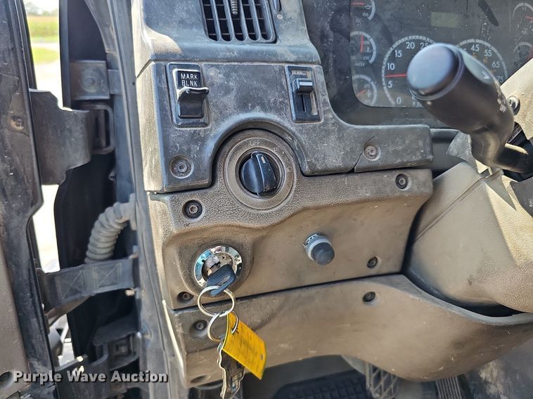 image for item DQ0250 2002 Sterling M8500 Acterra  refuse truck