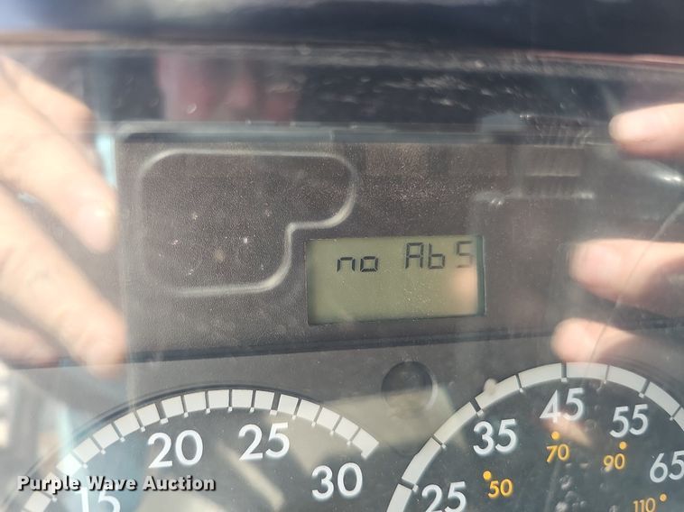 image for item DQ0250 2002 Sterling M8500 Acterra  refuse truck