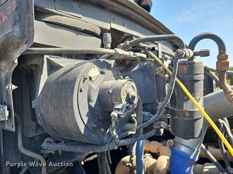 image for item DQ0250 2002 Sterling M8500 Acterra  refuse truck