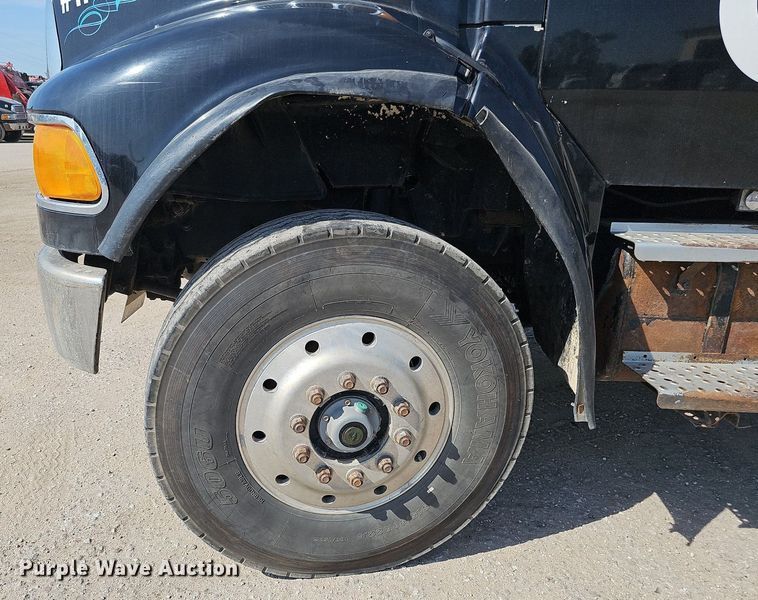 image for item DQ0250 2002 Sterling M8500 Acterra  refuse truck