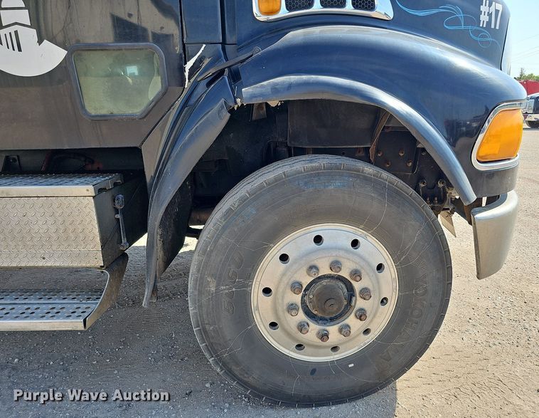 image for item DQ0250 2002 Sterling M8500 Acterra  refuse truck