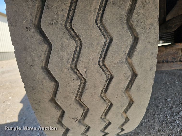 image for item DQ0250 2002 Sterling M8500 Acterra  refuse truck