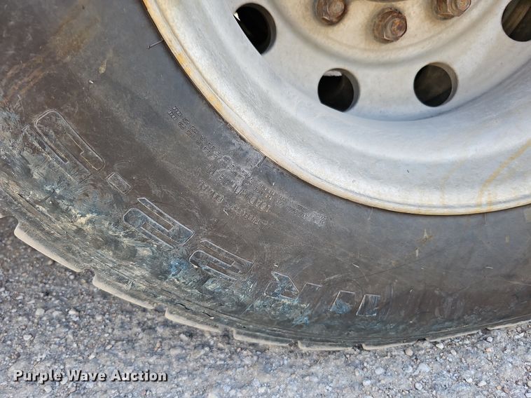 image for item DQ0250 2002 Sterling M8500 Acterra  refuse truck