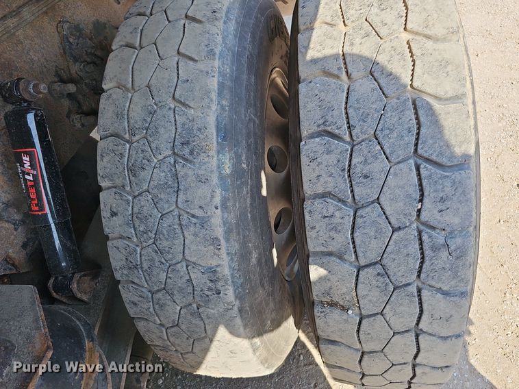 image for item DQ0250 2002 Sterling M8500 Acterra  refuse truck