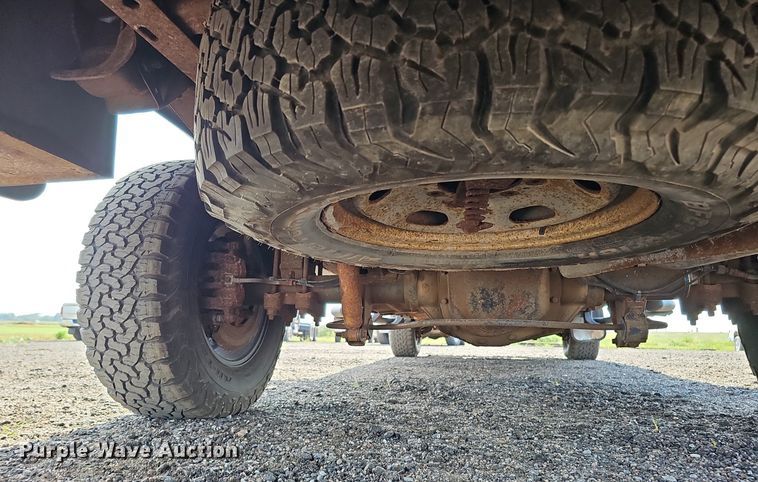 image for item DQ0263 2011 Ford  F350 Super Duty  SuperCab utility bed pickup truck