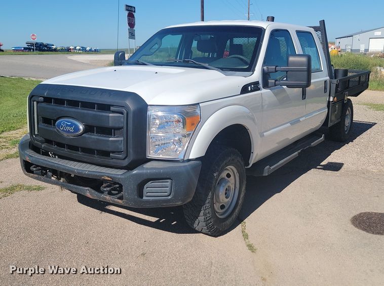 image for item LQ9098 2011 Ford F250 Super Duty XL  Crew Cab flatbed pickup truck