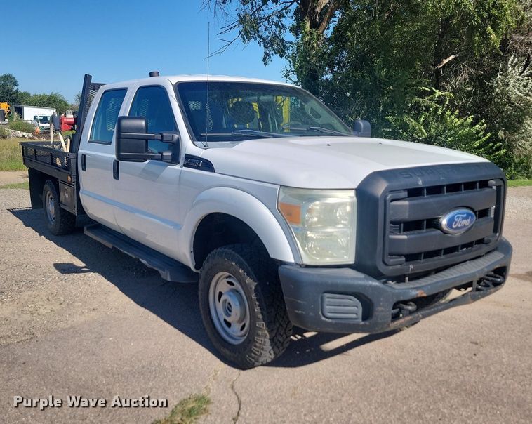 image for item LQ9098 2011 Ford F250 Super Duty XL  Crew Cab flatbed pickup truck