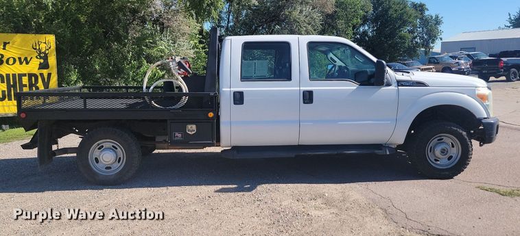 image for item LQ9098 2011 Ford F250 Super Duty XL  Crew Cab flatbed pickup truck