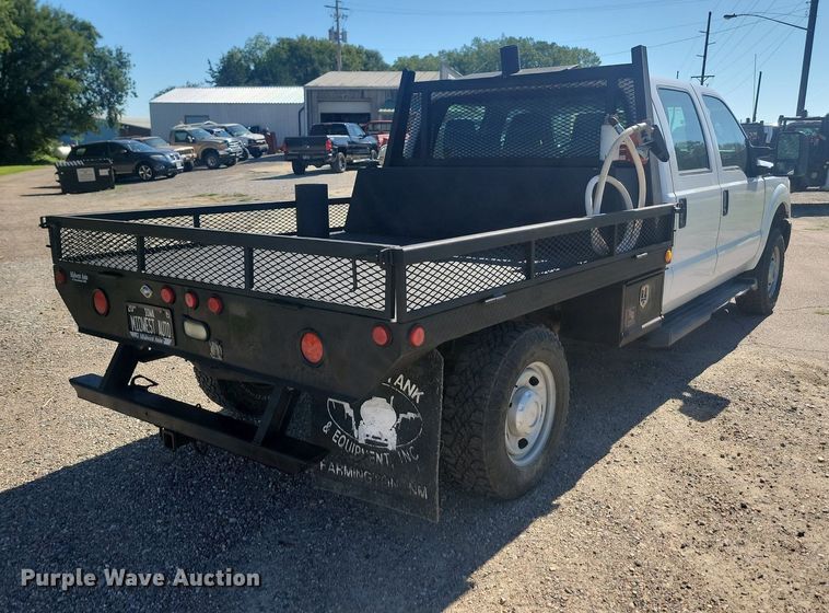 image for item LQ9098 2011 Ford F250 Super Duty XL  Crew Cab flatbed pickup truck
