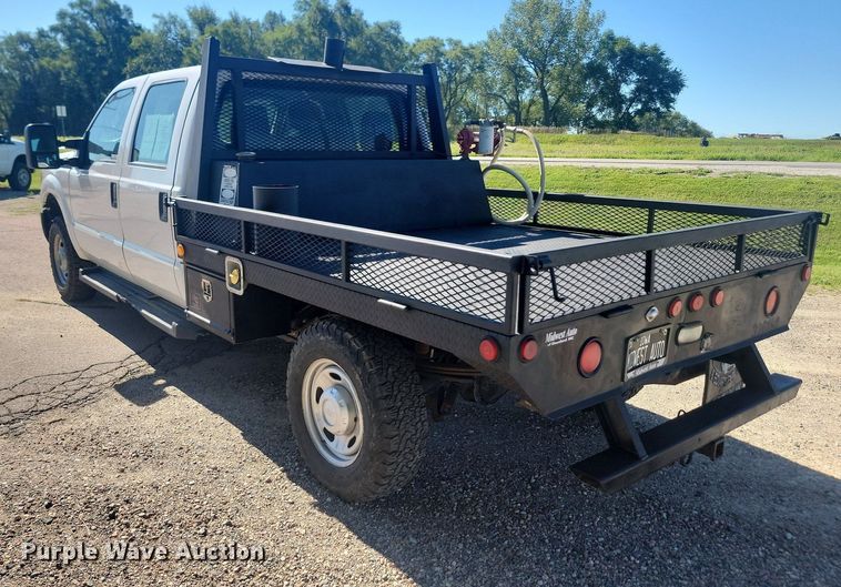 image for item LQ9098 2011 Ford F250 Super Duty XL  Crew Cab flatbed pickup truck