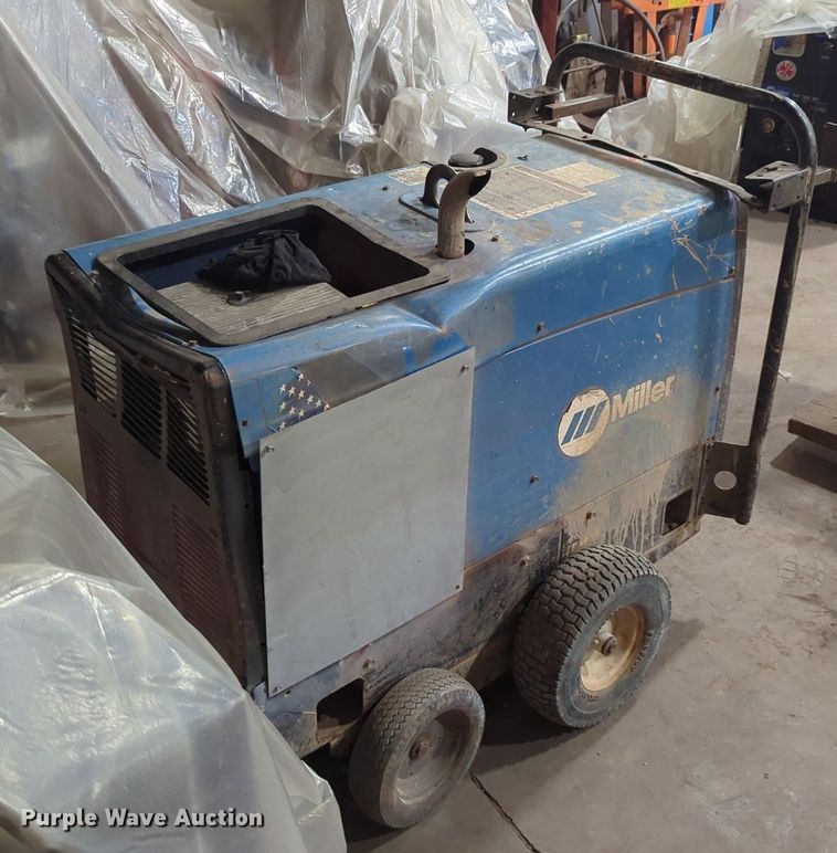 image for item LY9383 Miller Bobcat 225  welder/generator