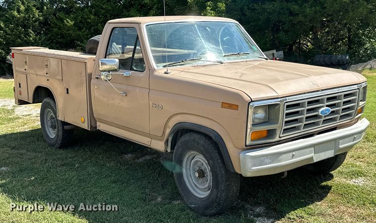 image for item ML9265 1984 Ford F250  utility bed pickup truck