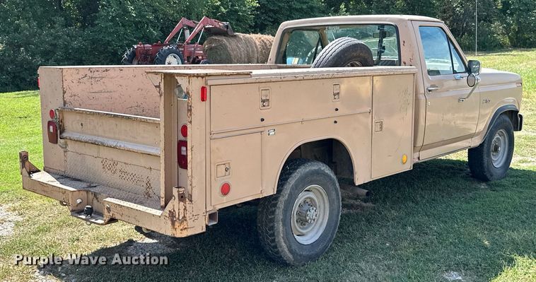 image for item ML9265 1984 Ford F250  utility bed pickup truck