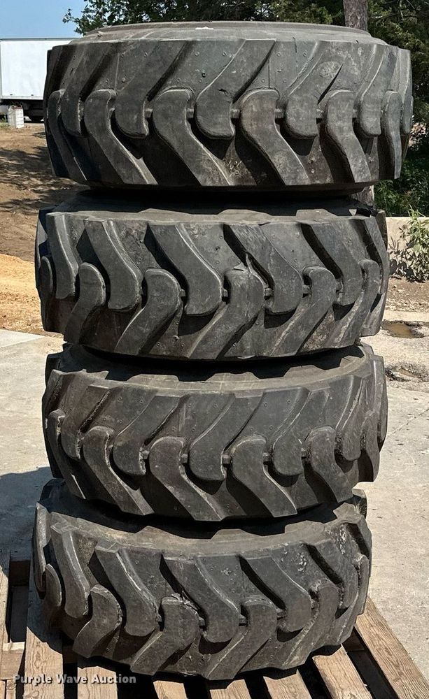 image for item MQ9374 (8) 14-17.5 NHS tires and wheels