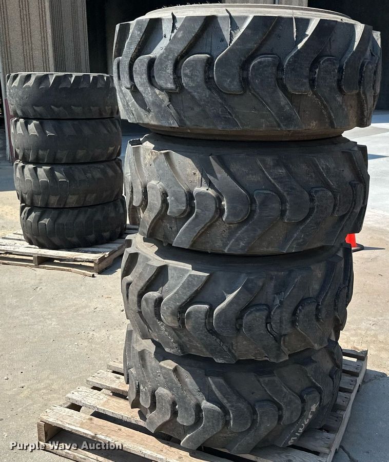 image for item MQ9374 (8) 14-17.5 NHS tires and wheels