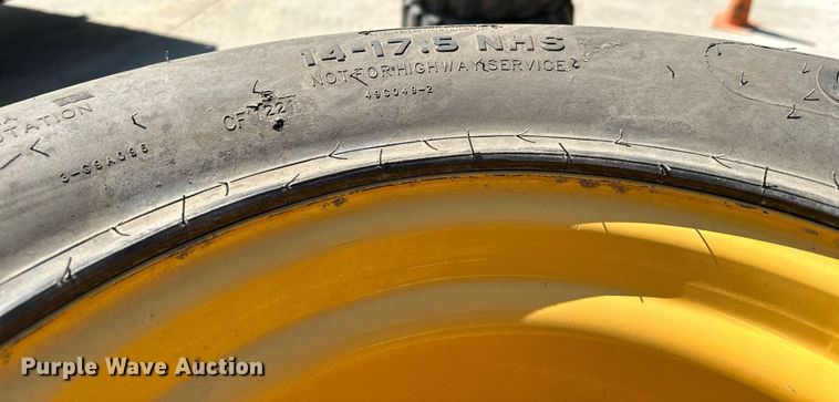 image for item MQ9374 (8) 14-17.5 NHS tires and wheels