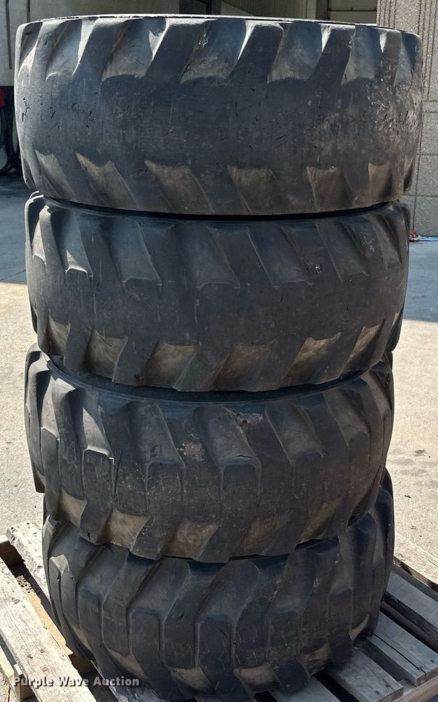 image for item MQ9374 (8) 14-17.5 NHS tires and wheels