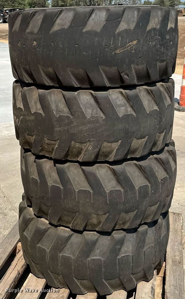 image for item MQ9374 (8) 14-17.5 NHS tires and wheels