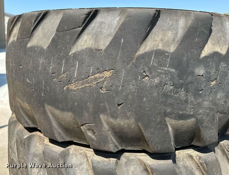 image for item MQ9374 (8) 14-17.5 NHS tires and wheels