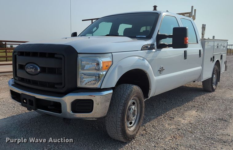 image for item MX9366 2014 Ford F350 Super Duty  Crew Cab utility bed pickup truck