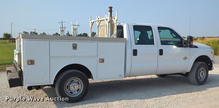 image for item MX9366 2014 Ford F350 Super Duty  Crew Cab utility bed pickup truck