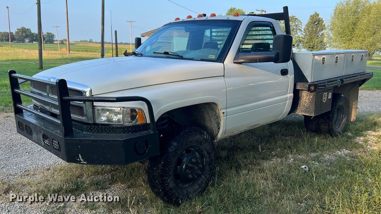 image for item NA9140 1995 Dodge Ram 3500 Laramie SLT  flatbed pickup truck