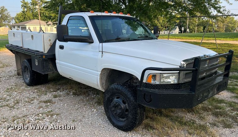 image for item NA9140 1995 Dodge Ram 3500 Laramie SLT  flatbed pickup truck