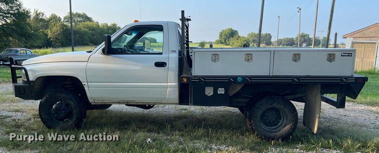 image for item NA9140 1995 Dodge Ram 3500 Laramie SLT  flatbed pickup truck