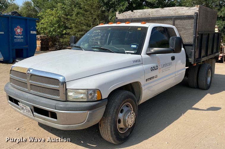 image for item NT9533 2001 Dodge Ram 3500  Quad Cab flatbed pickup truck