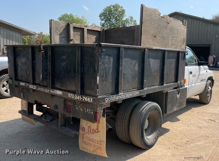 image for item NT9533 2001 Dodge Ram 3500  Quad Cab flatbed pickup truck