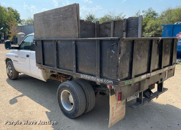 image for item NT9533 2001 Dodge Ram 3500  Quad Cab flatbed pickup truck