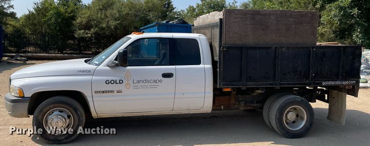 image for item NT9533 2001 Dodge Ram 3500  Quad Cab flatbed pickup truck