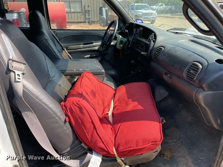 image for item NT9533 2001 Dodge Ram 3500  Quad Cab flatbed pickup truck