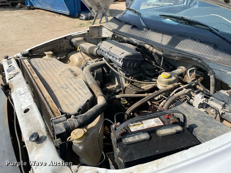 image for item NT9533 2001 Dodge Ram 3500  Quad Cab flatbed pickup truck